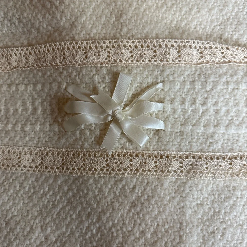 Irish baby blanket by Branigan Weavers Cream color with lace and satin bows